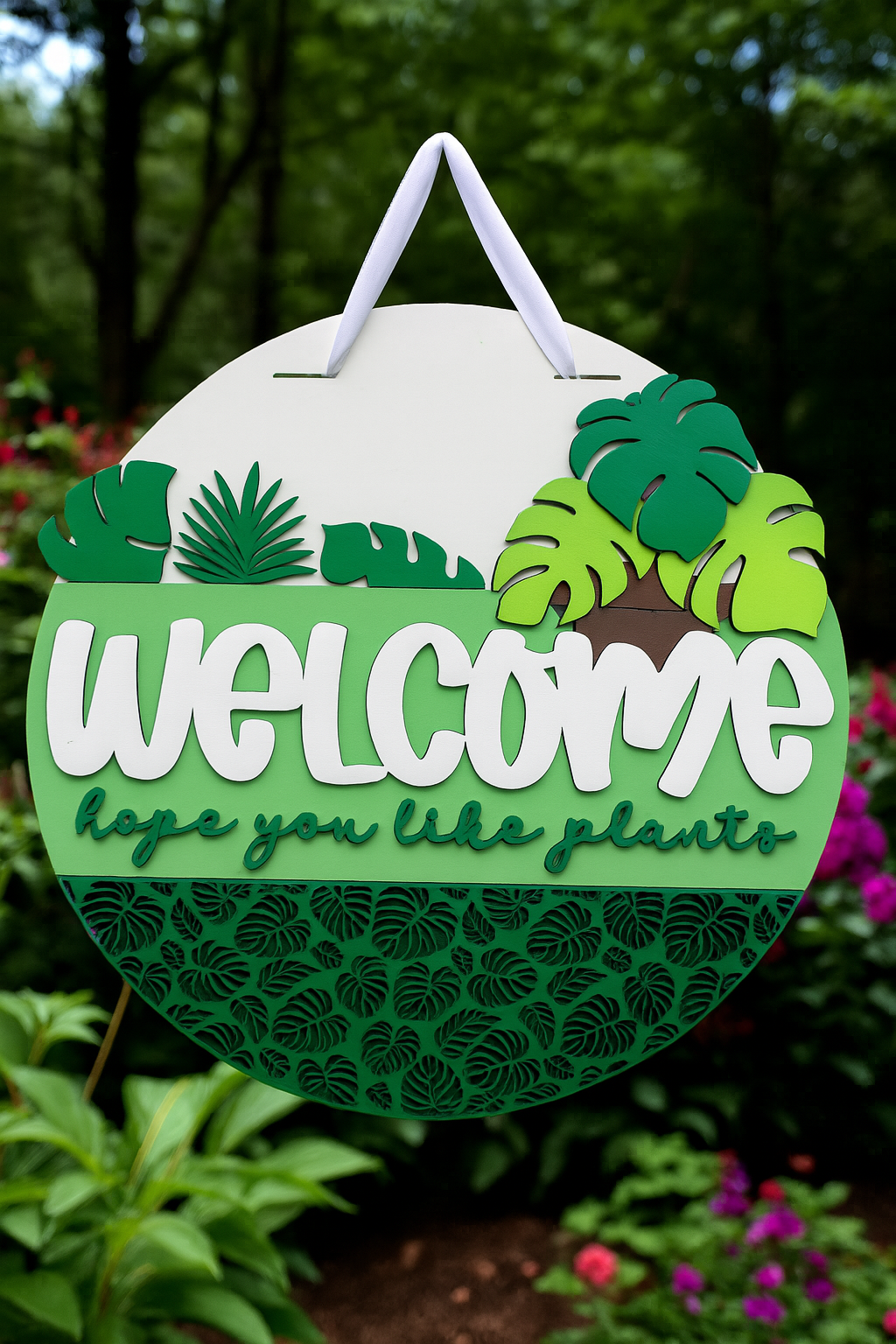3D laser cut door hanger with tropical leaf pattern and plant lover greeting message