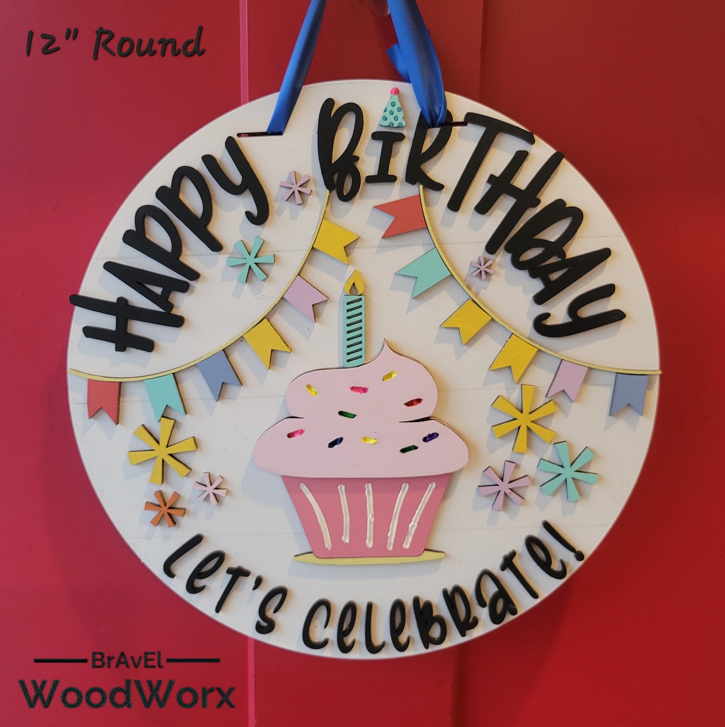 An image displaying the 'Birthday Bliss: Festive Shelf Door Hanger,' a cheerful and colorful decoration. The hanger features interchangeable festive elements, perfect for adding a seasonal birthday touch to your door or entryway. Medium