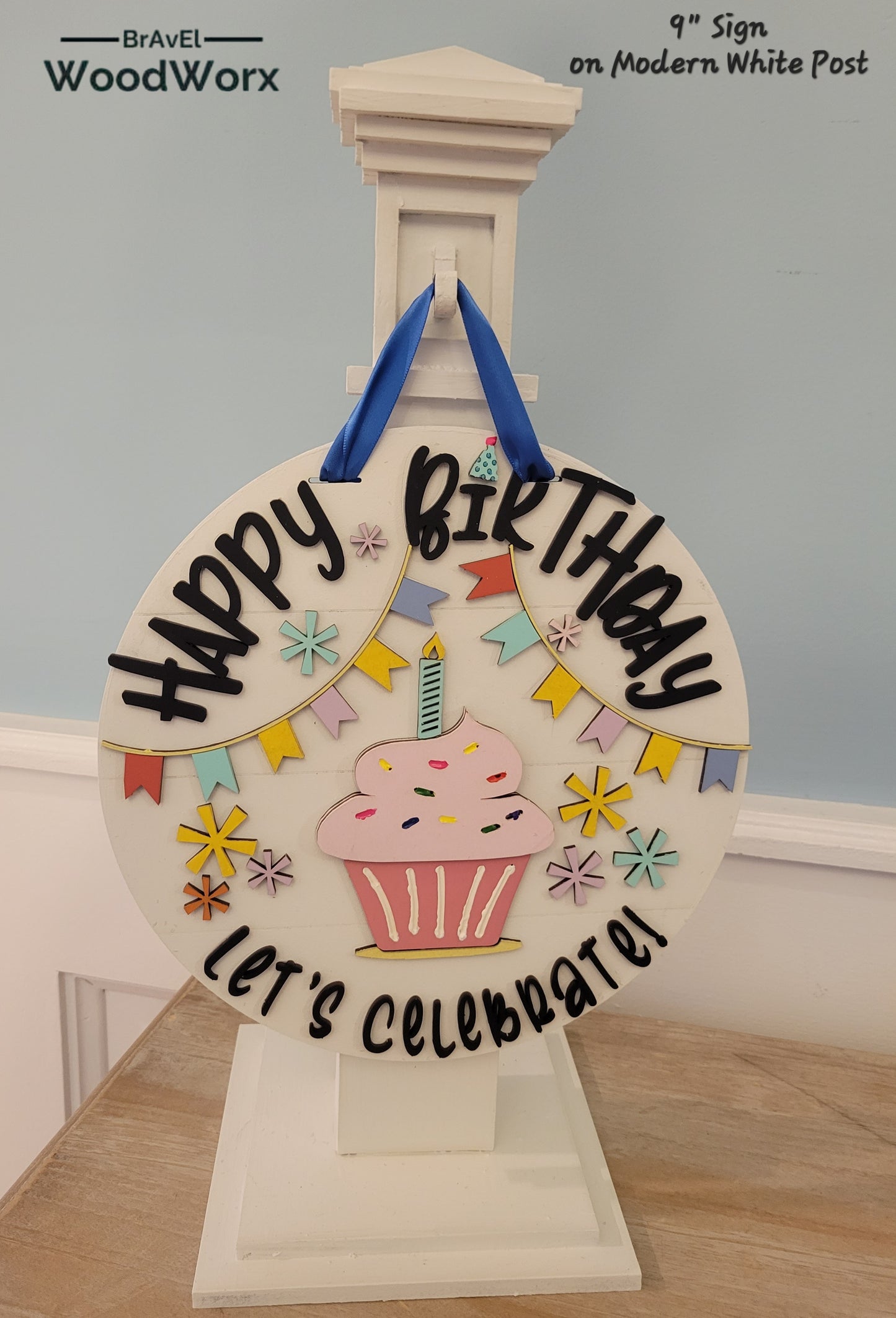 An image showcasing the 'Birthday Bliss: Festive Shelf Post Stand,' a decorative piece for home celebrations. The stand features vibrant, colorful details with interchangeable festive elements, ideal for seasonal birthday decor on shelves or tabletops. Front