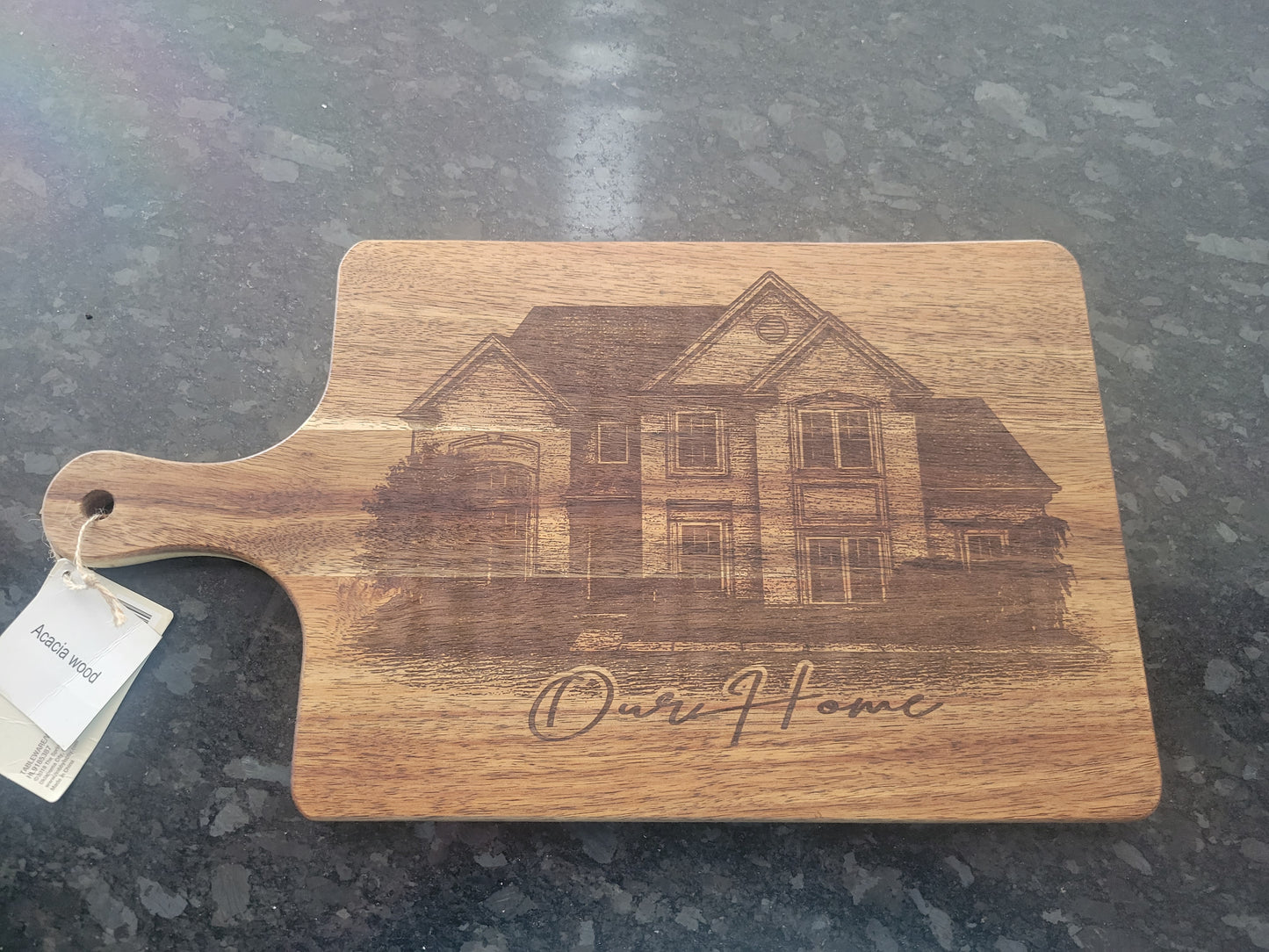 "Custom engraved charcuterie board perfect for newlyweds and new homeowners with Our Home design"