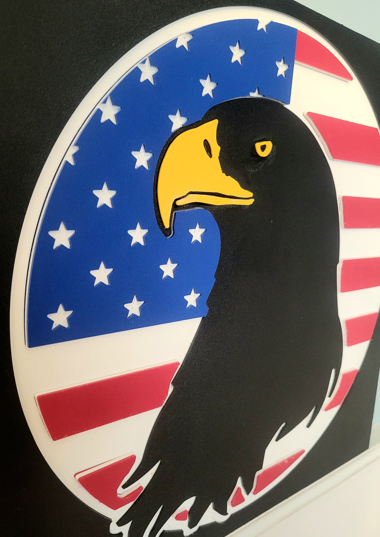 Laser-precise plastic eagle decor with USA flag elements, suitable for home or outdoor display