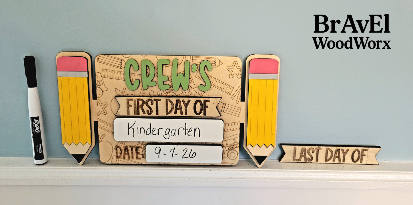 Wooden plaque with 'First Day of Kindergarten' and 'Last Day of' text, accompanied by pencil-shaped markers, on a light blue background.