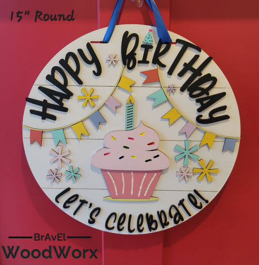 An image displaying the 'Birthday Bliss: Festive Shelf Door Hanger,' a cheerful and colorful decoration. The hanger features interchangeable festive elements, perfect for adding a seasonal birthday touch to your door or entryway. Large