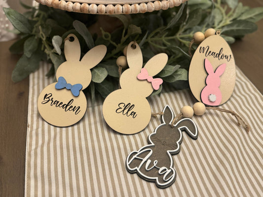 Personalized Easter basket tag, laser-cut from high-quality wood and hand-painted with vibrant colors. Custom name tag attached to a festive Easter basket, adding a charming and unique touch. Perfect for kids, family, and holiday gifting.