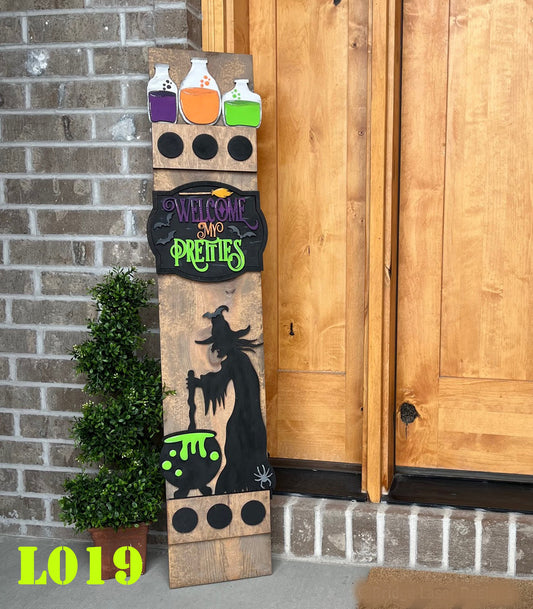 Halloween-themed wooden sign with potion bottles and witch design against a brick wall.