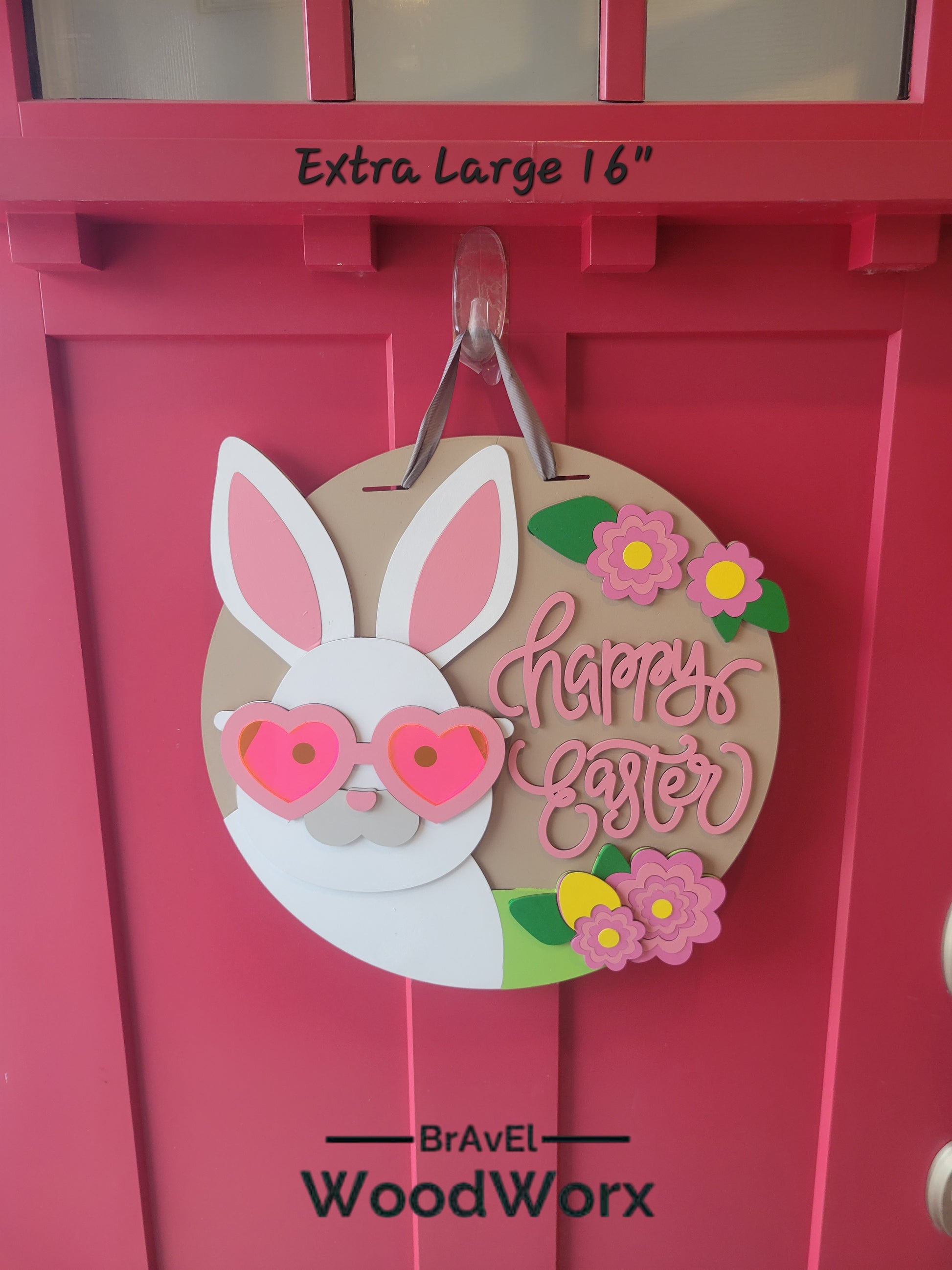 Happy Easter Bunny Door Hanger with Acrylic Sunglasses – Festive Spring Decor. Adorable wooden Easter bunny sign featuring stylish acrylic sunglasses, perfect for adding a fun and cheerful touch to your front door or home decor. Ideal for springtime decorations, Easter celebrations, and seasonal gifts. Handmade and high-quality, this cute bunny hanger enhances your holiday spirit. Great for indoor and outdoor use. Door Zoom