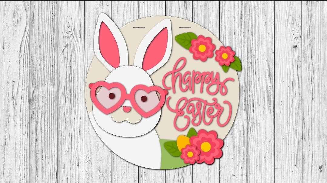 Happy Easter Bunny Door Hanger with Acrylic Sunglasses – Festive Spring Decor. Adorable wooden Easter bunny sign featuring stylish acrylic sunglasses, perfect for adding a fun and cheerful touch to your front door or home decor. Ideal for springtime decorations, Easter celebrations, and seasonal gifts. Handmade and high-quality, this cute bunny hanger enhances your holiday spirit. Great for indoor and outdoor use. Sample
