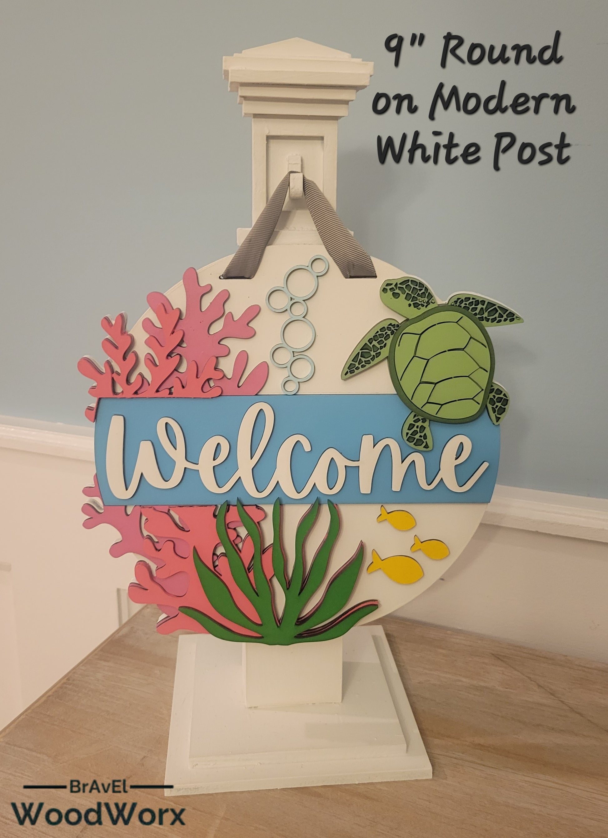 Welcome Sea Turtle Sign: A beautifully crafted wooden sign featuring a laser-engraved sea turtle design with the word 'Welcome' elegantly displayed. The sign has a coastal theme with soothing colors, perfect for beach houses, marine enthusiasts, or as a welcoming decorative piece for any space. White Post