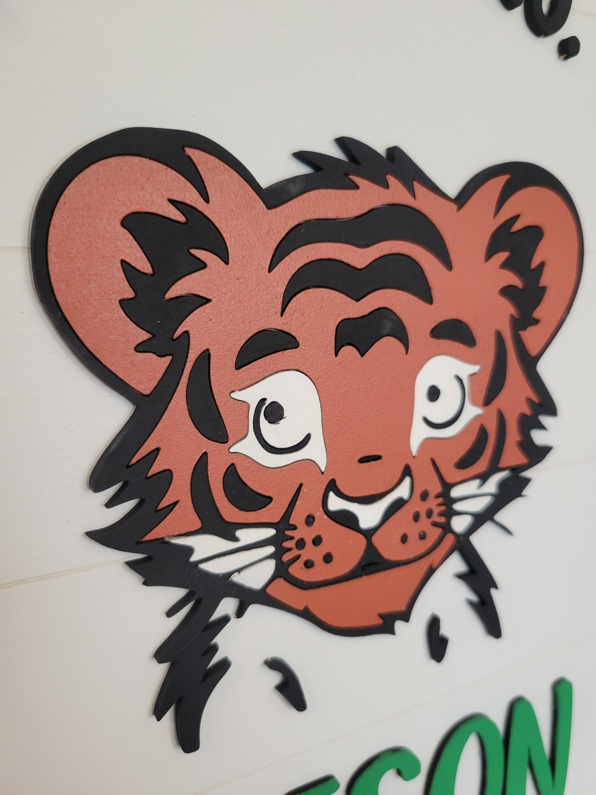 Tiger logo cutout on a white background