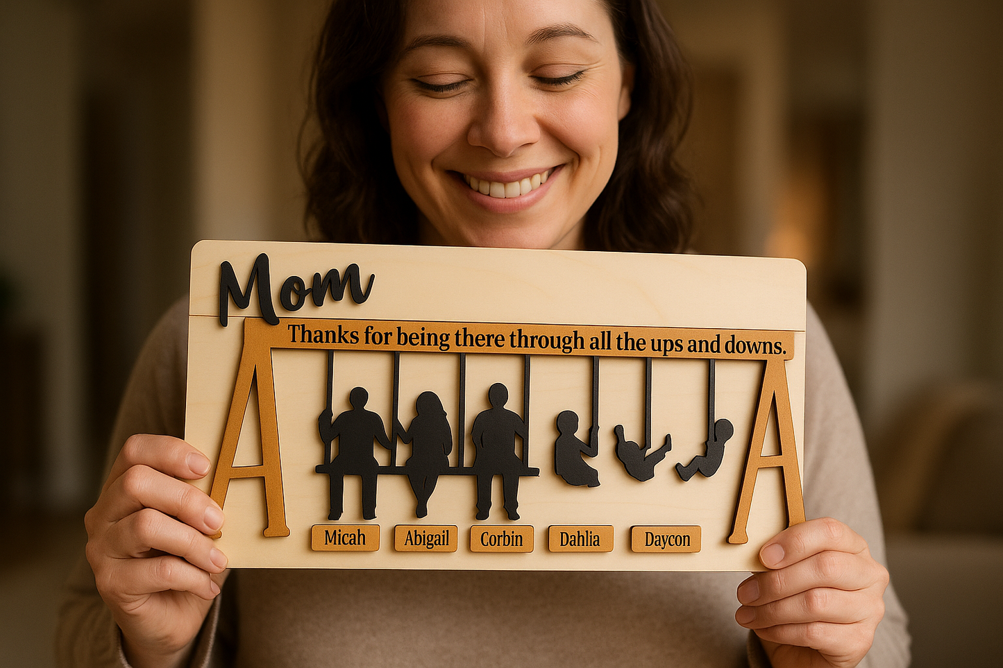 Mother holding the wooden swing set sign