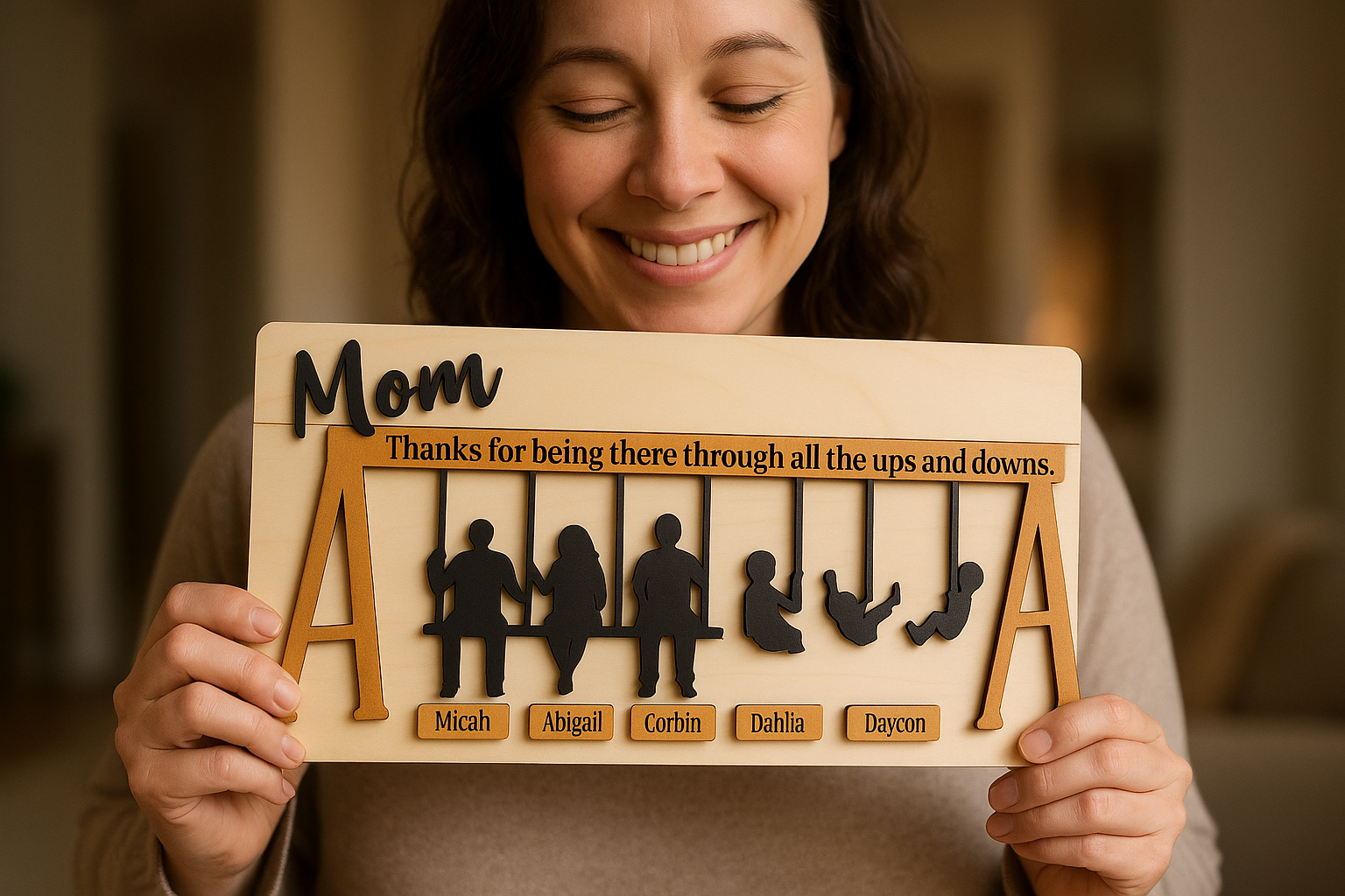 Mother holding the wooden swing set sign