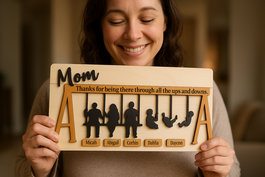 Mother holding the wooden swing set sign