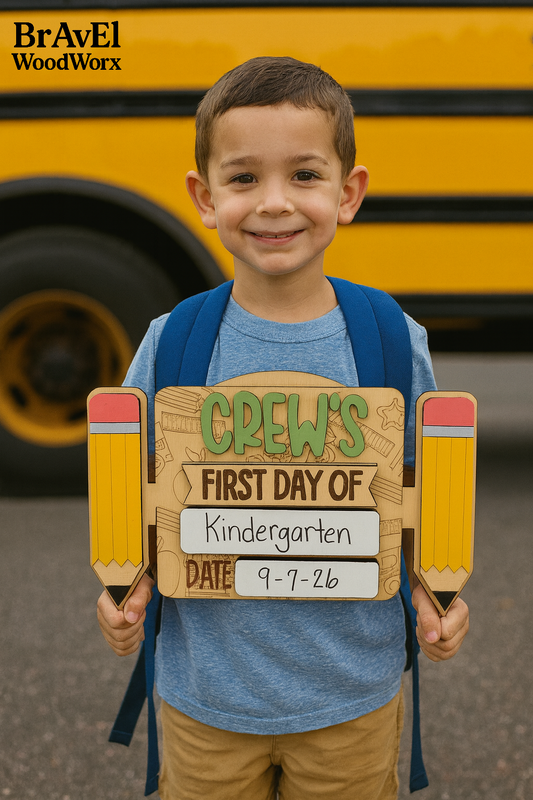 Child holding a 'First Day of Kindergarten' sign in front of a school bus, with 'BravEl WoodWorx' branding.
