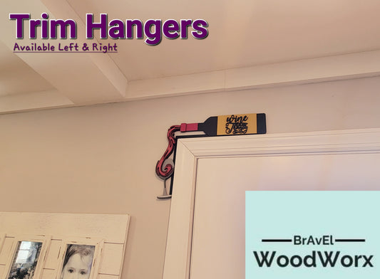 Wine Therapy door trim hanger: A beautifully crafted wooden sign featuring the words 'Wine Therapy' elegantly engraved. The sign is designed to hang seamlessly on a door trim, adding a touch of charm and personality to any space. Perfect for wine enthusiasts and as a thoughtful gift.